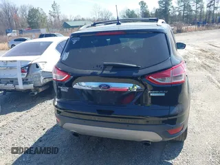 2016 Ford Escape Titanium with VIN 1FMCU0JX8GUC06601, listed as a IAAI auction lot 41785774 with 121,427 mi miles. Bid and sale history available at carsss.com. Image 16.