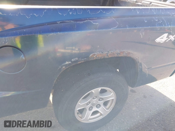 2005 Dodge Dakota SLT with VIN 1D7HW42N15S365967, listed as a IAAI auction lot 41798935 with 220,243 mi miles and . Bid and sale history available at DreamBid. Image 6.