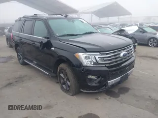 2021 Ford Expedition XLT with VIN 1FMJU1JT7MEA71014, listed as a IAAI auction lot 41219835 with 93,725 mi miles. Bid and sale history available at carsss.com. Image 1.