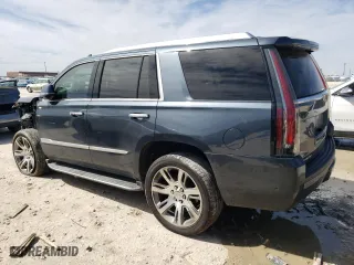 2020 Cadillac Escalade Luxury with VIN 1GYS3BKJ7LR178967, listed as a Copart auction lot 48310755 with 94,579 mi miles and Salvage Title. Bid and sale history available at carsss.com. Image 2.
