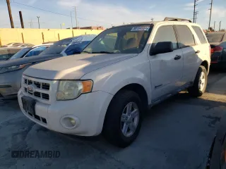 2009 Ford Escape Hybrid z VIN 1FMCU49399KC67009, wystawiony jako Copart lot #80194904 z przebiegiem 169 633 mil mil oraz Czysty tytuł • Clean title. Historia ofert i sprzedaży dostępna na DreamBid. Obrazek 1.