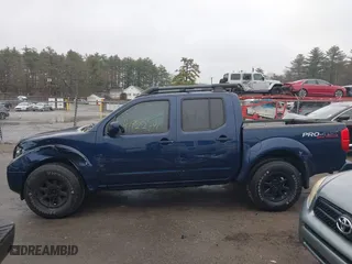 2011 Nissan Frontier PRO-4X with VIN 1N6AD0EV8BC435649, listed as a IAAI auction lot 41922791 with 203,928 mi miles. Bid and sale history available at carsss.com. Image 14.