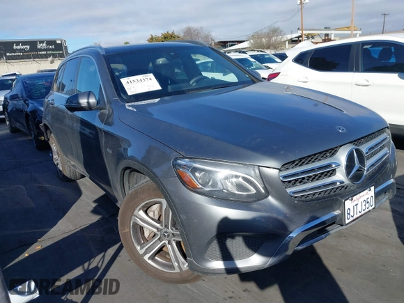 2019 Mercedes-Benz GLC 350e z VIN WDC0G5EB1KF579447, wystawiony jako IAAI lot #41534374 z przebiegiem 88 601 mil mil oraz . Historia ofert i sprzedaży dostępna na DreamBid. Obrazek 1.