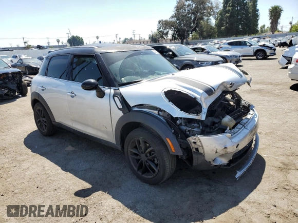 2012 MINI Countryman with VIN WMWZB3C58CWM02843, listed as a Copart auction lot 52131715 with Not Provided miles and Salvage Title. Bid and sale history available at DreamBid. Image 4.