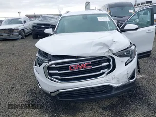 2020 GMC Terrain SLT z VIN 3GKALVEVXLL143417, wystawiony jako IAAI lot #41714662 z przebiegiem 97 634 mil mil oraz . Historia ofert i sprzedaży dostępna na DreamBid. Obrazek 6.