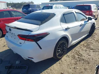 2022 Toyota Camry SE with VIN 4T1T11AK2NU705586, listed as a IAAI auction lot 41706704 with 52,607 mi miles. Bid and sale history available at carsss.com. Image 4.
