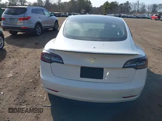 2021 Tesla Model 3 Long Range with VIN 5YJ3E1EB2MF858267, listed as a IAAI auction lot 41782360 with 79,671 mi miles and . Bid and sale history available at DreamBid. Image 16.