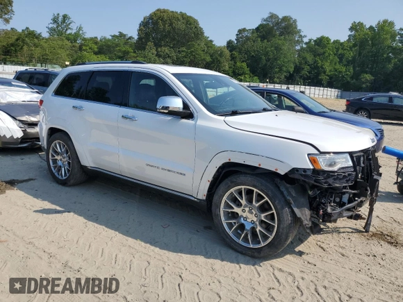 2014 Jeep Grand Cherokee Summit with VIN 1C4RJFJG9EC474781, listed as a Copart auction lot 60720325 with 64,546 mi miles and Salvage title. Bid and sale history available at DreamBid. Image 4.