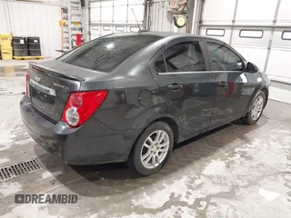 2015 Chevrolet Sonic LT with VIN 1G1JC5SH0F4149529, listed as a IAAI auction lot 41958450 with 227,946 mi miles and . Bid and sale history available at DreamBid. Image 4.