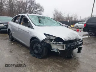 2013 Ford Focus SE z VIN 1FADP3F28DL107069, wystawiony jako IAAI lot #41412256 z przebiegiem 160 727 mil mil oraz . Historia ofert i sprzedaży dostępna na DreamBid. Obrazek 1.