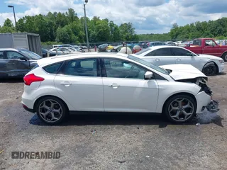 2016 Ford Focus Titanium with VIN 1FADP3N21GL309340, listed as a IAAI auction lot 42518653 with 101,555 mi miles and . Bid and sale history available at DreamBid. Image 13.