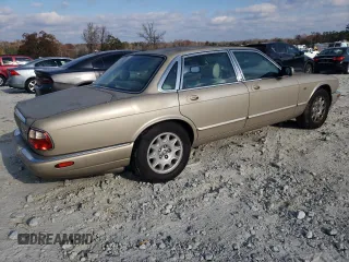 1998 Jaguar XJ with VIN SAJHX1242WC845736, listed as a Copart auction lot 82006044 with 188,785 mi miles and Salvage title. Bid and sale history available at DreamBid. Image 3.