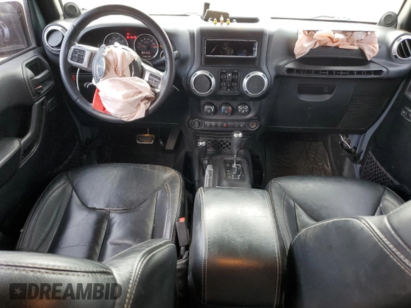 2014 Jeep Wrangler Unlimited Rubicon z VIN 1C4HJWFG0EL316513, wystawiony jako Copart lot #57182325 z przebiegiem 150 012 mil mil oraz Szkoda całkowita • Salvage title. Historia ofert i sprzedaży dostępna na DreamBid. Obrazek 8.