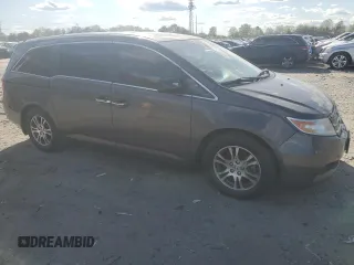 2012 Honda Odyssey EX-L with VIN 5FNRL5H64CB105215, listed as a Copart auction lot 53634125 with 149,310 mi miles and Salvage Title. Bid and sale history available at carsss.com. Image 4.
