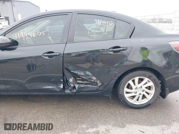 2012 Mazda 3 i Grand Touring with VIN JM1BL1W70C1657521, listed as a IAAI auction lot 41994605 with 165,912 mi miles and . Bid and sale history available at DreamBid. Image 6.