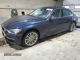 2013 BMW 3 Series 328i xDrive with VIN WBA3B3C57DF537268, listed as a Copart auction lot 57885985 with 122,050 mi miles and Salvage title. Bid and sale history available at DreamBid. Image 1.