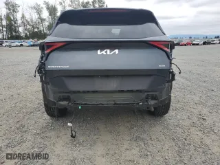 2023 Kia Sportage Hybrid EX with VIN KNDPVCAG6P7012667, listed as a Copart auction lot 70246434 with 21,595 mi miles and Salvage Title. Bid and sale history available at carsss.com. Image 6.