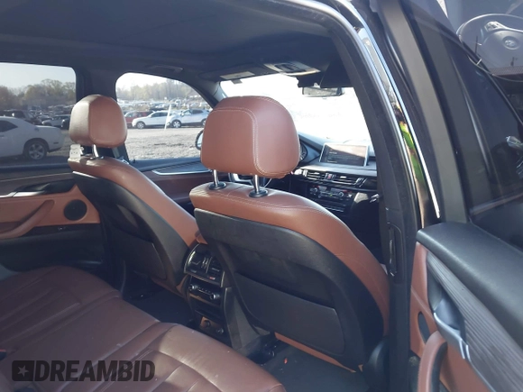2017 BMW X5 sDrive35i with VIN 5UXKR2C3XH0X06113, listed as a IAAI auction lot 41951474 with 139,420 mi miles. Bid and sale history available at carsss.com. Image 8.