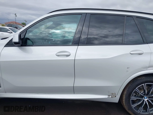 2020 BMW X5 sDrive40i with VIN 5UXCR4C04L9D41635, listed as a IAAI auction lot 42201174 with 64,989 mi miles and . Bid and sale history available at DreamBid. Image 14.