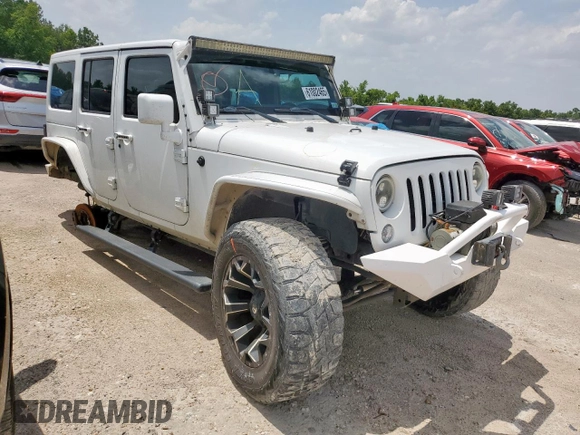 2015 Jeep Wrangler Unlimited Sport with VIN 1C4BJWDG9FL759012, listed as a Copart auction lot 61002465 with 101,395 mi miles and Salvage title. Bid and sale history available at DreamBid. Image 4.