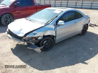 2007 Honda Civic Cpe EX with VIN 2HGFG128X7H547623, listed as a IAAI auction lot 42033010 with 228,518 mi miles. Bid and sale history available at carsss.com. Image 2.