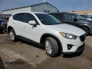 2014 Mazda CX-5 Grand Touring with VIN JM3KE4DY1E0361849, listed as a Copart auction lot 52043465 with 349,688 mi miles and Clean Title. Bid and sale history available at carsss.com. Image 4.