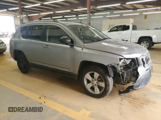 2016 Jeep Compass Sport z VIN 1C4NJCBA9GD810594, wystawiony jako Copart lot #56961885 z przebiegiem 151 386 mil mil oraz Szkoda całkowita • Salvage title. Historia ofert i sprzedaży dostępna na DreamBid. Obrazek 4.
