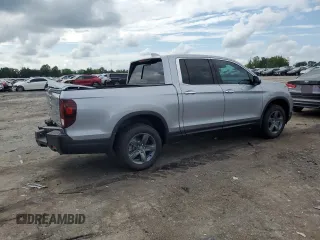 2023 Honda Ridgeline RTL-E with VIN 5FPYK3F70PB018858, listed as a Copart auction lot 64210205 with 16,562 mi miles and Salvage title. Bid and sale history available at DreamBid. Image 3.
