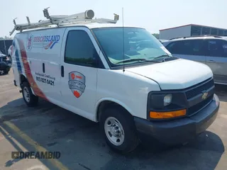 2015 Chevrolet Express Cargo Van with VIN 1GCWGFCF8F1255703, listed as a IAAI auction lot 41995763 with 215,212 mi miles. Bid and sale history available at carsss.com. Image 1.