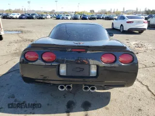 2002 Chevrolet Corvette with VIN 1G1YY22G825121021, listed as a Copart auction lot 49741235 with 104,964 mi miles and Salvage Title. Bid and sale history available at carsss.com. Image 6.