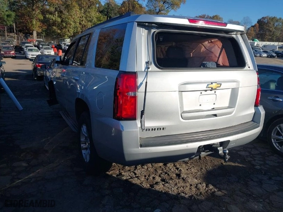 2015 Chevrolet Tahoe LT with VIN 1GNSCBKC8FR120417, listed as a IAAI auction lot 40931118 with 176,609 mi miles. Bid and sale history available at carsss.com. Image 3.