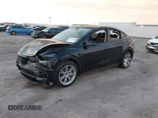 2023 Tesla Model Y Long Range z VIN 7SAYGDEE2PA166042, wystawiony jako IAAI lot #41348960 z przebiegiem Nie podano mil oraz . Historia ofert i sprzedaży dostępna na DreamBid. Obrazek 14.