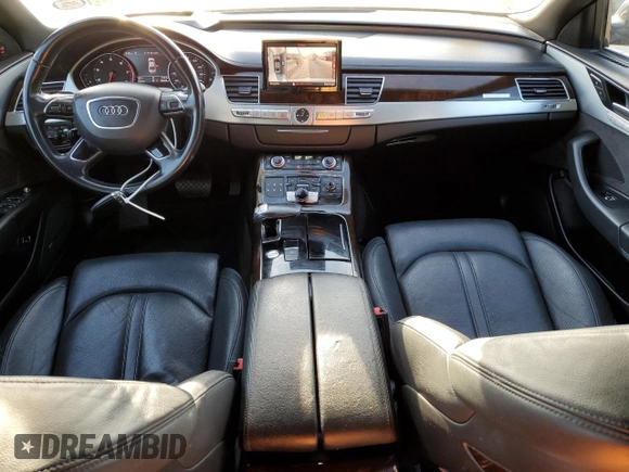 2015 Audi A8 z VIN WAUJGAFD7FN032176, wystawiony jako Copart lot #76943904 z przebiegiem 126 423 mil mil oraz Czysty tytuł • Clean title. Historia ofert i sprzedaży dostępna na DreamBid. Obrazek 8.