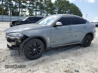 2015 BMW X6 xDrive35i z VIN 5UXKU2C57F0F94905, wystawiony jako Copart lot #57748765 z przebiegiem 153 710 mil mil oraz Szkoda całkowita • Salvage title. Historia ofert i sprzedaży dostępna na DreamBid. Obrazek 1.
