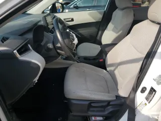 2022 Toyota Corolla Cross LE z VIN 7MUCAAAG0NV034364, wystawiony jako Copart lot #54845725 z przebiegiem 28 200 mil mil oraz Szkody całkowita. Historia ofert i sprzedaży dostępna na DreamBid. Obrazek 7.