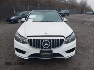2014 Mercedes-Benz E 550 Sport with VIN WDDHF9BBXEA940995, listed as a IAAI auction lot 41872452 with 50,451 mi miles and . Bid and sale history available at DreamBid. Image 13.