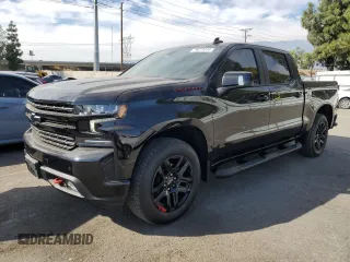 2022 Chevrolet Silverado 1500 RST with VIN 1GCPWDED5NZ142606, listed as a Copart auction lot 79077014 with 26,769 mi miles and Salvage Title. Bid and sale history available at carsss.com. Image 1.