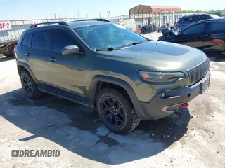 2019 Jeep Cherokee Trailhawk Elite z VIN 1C4PJMBN7KD287506, wystawiony jako IAAI lot #42072589 z przebiegiem 108 034 mil mil oraz . Historia ofert i sprzedaży dostępna na DreamBid. Obrazek 1.