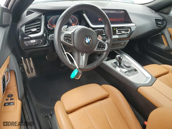 2022 BMW Z4 sDrive30i with VIN WBAHF3C06NWX82076, listed as a Copart auction lot 75177644 with 2,824 mi miles and Salvage Title. Bid and sale history available at carsss.com. Image 8.