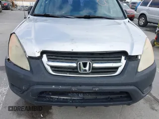 2002 Honda CR-V LX with VIN JHLRD68422C008983, listed as a IAAI auction lot 42112835 with 198,114 mi miles and . Bid and sale history available at carsss.com. Image 6.