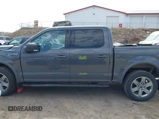 2018 Ford F-150 XL z VIN 1FTEW1EG7JFD52734, wystawiony jako IAAI lot #42104352 z przebiegiem 68 614 mil mil oraz . Historia ofert i sprzedaży dostępna na DreamBid. Obrazek 14.