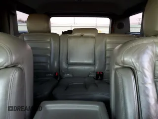 2005 Hummer H2 SUV with VIN 5GRGN23U55H105263, listed as a Copart auction lot 80446754 with 162,538 mi miles and Salvage Title. Bid and sale history available at carsss.com. Image 10.