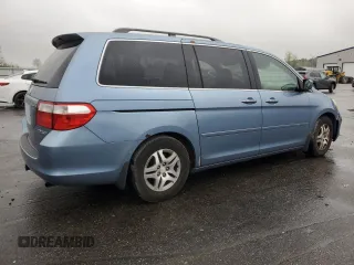 2005 Honda Odyssey EX-L with VIN 5FNRL38645B060123, listed as a Copart auction lot 51112735 with 227,247 mi miles and Salvage Title. Bid and sale history available at carsss.com. Image 3.