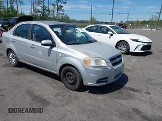 2007 Chevrolet Aveo LS z VIN KL1TD56617B098732, wystawiony jako IAAI lot #41889243 z przebiegiem 115 426 mil mil oraz . Historia ofert i sprzedaży dostępna na DreamBid. Obrazek 1.