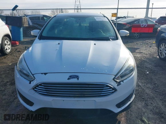 2016 Ford Focus SE with VIN 1FADP3F28GL348103, listed as a IAAI auction lot 41185718 with 69,256 mi miles. Bid and sale history available at carsss.com. Image 12.