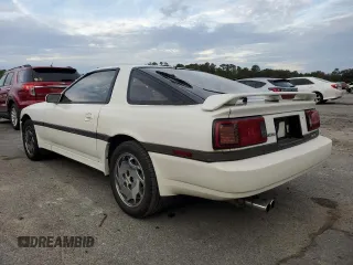 1988 Toyota Supra z VIN JT2MA71J0J0088041, wystawiony jako Copart lot #84402804 z przebiegiem 195 921 mil mil oraz Czysty tytuł • Clean title. Historia ofert i sprzedaży dostępna na DreamBid. Obrazek 2.