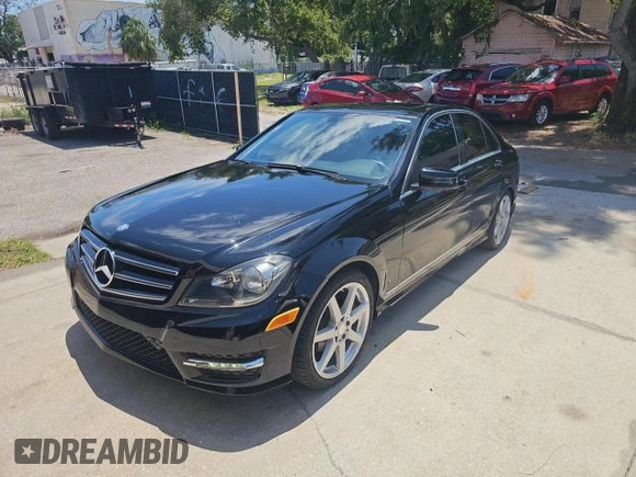 2014 Mercedes-Benz C 250 Sport with VIN WDDGF4HB3EA957269, listed as a Copart auction lot 65226545 with 100,479 mi miles and Clean title. Bid and sale history available at DreamBid. Image 2.