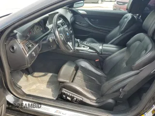 2014 BMW M6 z VIN WBSLX9C54ED160430, wystawiony jako Copart lot #66270794 z przebiegiem 92 025 mil mil oraz Szkoda całkowita • Salvage title. Historia ofert i sprzedaży dostępna na DreamBid. Obrazek 7.
