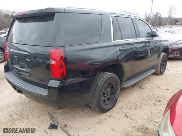 2018 Chevrolet Tahoe Commercial with VIN 1GNLCDEC3JR221708, listed as a IAAI auction lot 41157325 with 163,845 mi miles. Bid and sale history available at carsss.com. Image 4.