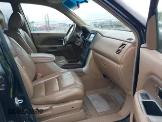 2006 Honda Pilot EX-L with VIN 2HKYF18726H552054, listed as a IAAI auction lot 41822652 with 153,822 mi miles and . Bid and sale history available at DreamBid. Image 5.